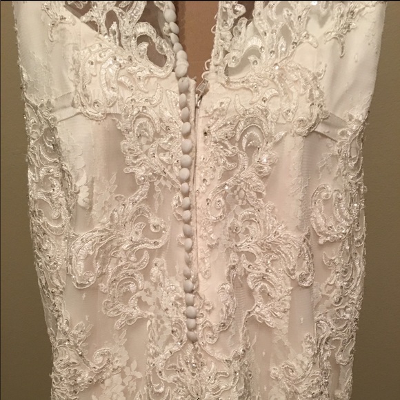 Wedding dress from David’s bridal Never worn. Size 8. Paid $1400 asking $600 - Picture 3 of 5